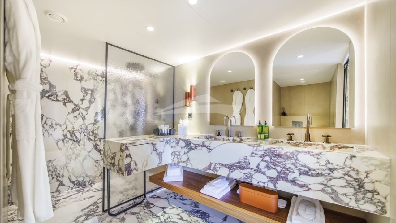 Master stateroom in en suite with his and her sinks and a shower