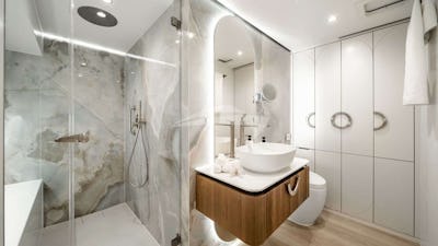 Master Head | Waterfall Shower, Full-Size Toliet, Spacious Storage