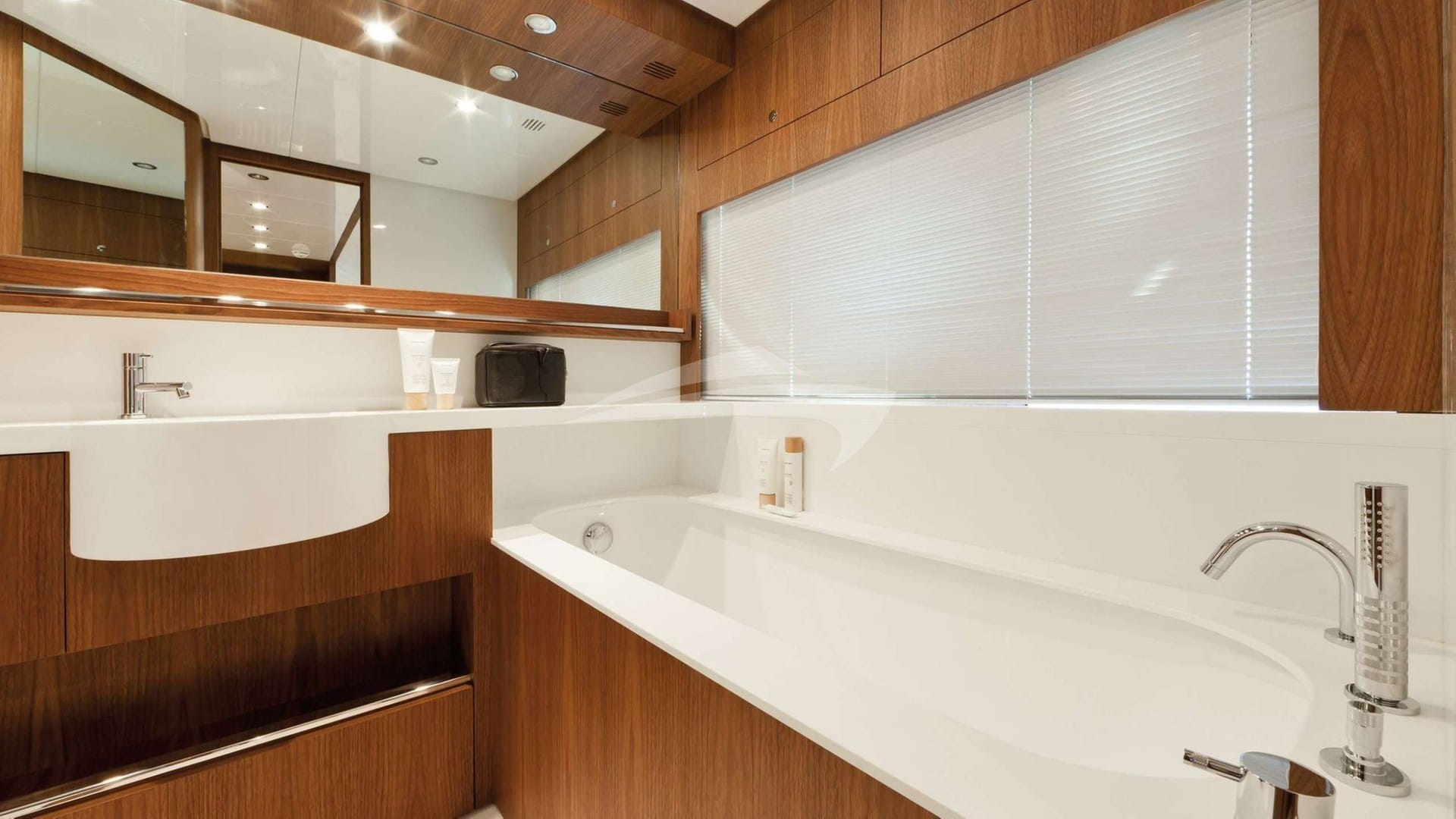 Double sink bathroom with shower walk through.