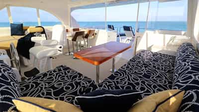 Flybridge helm, dining and lounging area