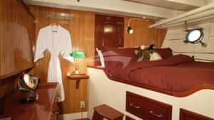 Stateroom 4: Double Bed + Pullman Single Bed on left.